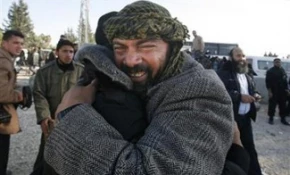 Palestinian pilgrims return home