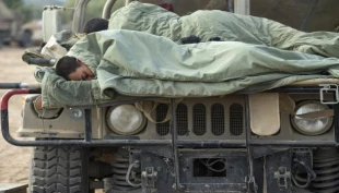 Wounded Israeli soldiers crowd into hospital
