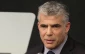 Lapid admits to unprecedented costs of war