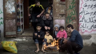 Gaza civil defense helps scores of citizens during harsh weather