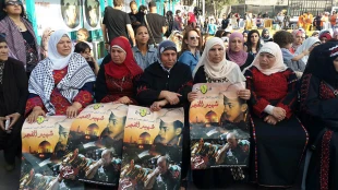 Israeli troops attack march commemorating Abu Khdeir