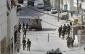 Israeli troopers withdraw from devastated occupied area