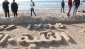 Photos: Palestinian artist shaping sand to recount Nakba