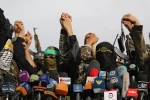 الأذرع العسكرية لفصائل المقاومة الفلسطينية خلال مؤتمر صحفي في غزة

 13