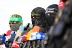 الأذرع العسكرية لفصائل المقاومة الفلسطينية خلال مؤتمر صحفي في غزة

 3