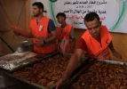 بالصور: الهلال الاحمر الايرانى يوزع ربع مليون وجبة افطار على الصائمين في قطاع غزة المحاصر 9