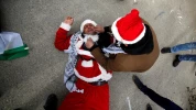 Photo Album: Israeli troops engage and arrest Santa protesters 4