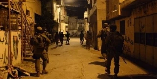 Zionist army invaded citizen's apartments In Ramallah, causing serious property damage