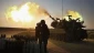 Israeli artillery shelled besieged Gaza Strip, injuring civilians