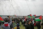 الفلسطينيون يحيون يوم الأرض بمسيرات العودة في غزة 8
