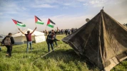 الفلسطينيون يحيون يوم الأرض بمسيرات العودة في غزة 16