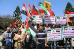 إحراق العلم الامريكي ورفع العلم الإيراني في تظاهرة بقطاع غزة 4