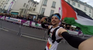 Palestine runners cross the finish line at the 2018 London Marathon