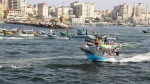 Dozens of Palestinian boats hold sea march along Gaza Strip against fishing limits 2