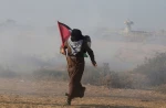 Israeli forces wound dozens of Palestinian protesters in Gaza Strip 2