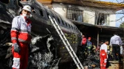 Pesawat Boeing 707 Jatuh atas Rumah Warga Tehran di Iran 8