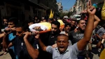 Palestinians hold funeral for man killed during Gaza protest 2