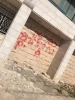 مستوطون يخطون شعارات عنصرية على مركبات ومنازل 5