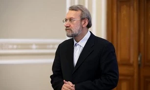 لاریجانی از نمایشگاه عکس مناطق سیل زده بازدید کرد