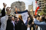 متظاهرون لبنانيون يرفعون علم فلسطين ويحرقون علم الاحتلال وصور ترمب 5