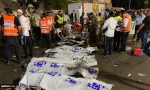 At least 40 Israelis are killed and scores of others injured, many critically, in a stampede during a Jewish bonfire festival held in the north of the occupied territories.