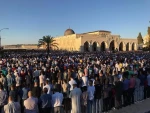 Palestinians perform Eid al-Fitr prayers marking the end of the holy fasting month of Ramadan in Al-Aqsa mosque.  