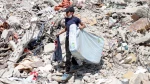 Palestinians in Gaza live by the rubble of their former homes
 5