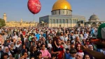 Over 100,000 Palestinians attend Eid prayers at Al-Aqsa Mosque following Israeli storming
 2