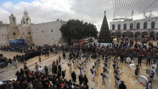 In pictures: Bethlehem marks Christmas Eve amid Covid measures 3