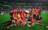 لاعبو المغرب يحتفلون بفوزهم برفع العلم الفلسطيني 3