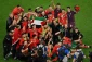 Morocco players celebrate with Palestinian flag after Spain upset