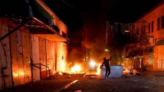 Zionist troops raid Ramallah, wound nearly a dozen Palestinians