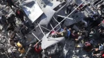 Israel massacres at least 70 Palestinians in airstrike on Gaza refugee camp