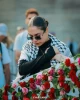 زنان نروژی در همبستگی با غزه تجمع کردند و با نثار گل یاد شهدای زن غزه را گرامی داشتند 2
