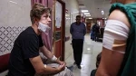 Zionist settlers beat up foreign volunteers assisting Palestinians  2
