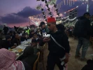 افطار دسته جمعی فلسطینیان روی ویرانه‌های خانه‌ها در رفح در جنوب نوار غزه  2